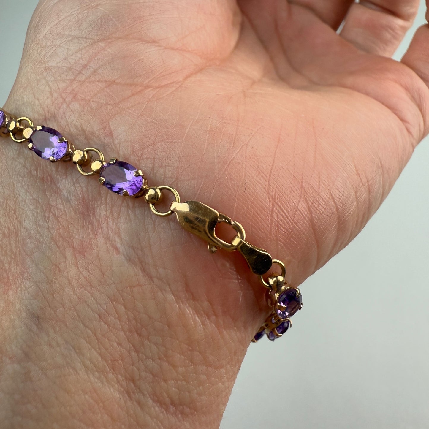 6.75" Solid 10K Yellow Gold Oval Amethyst Link Bracelet, 4.5g