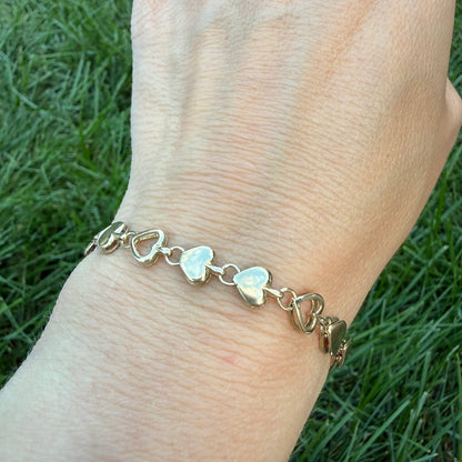 7.25" Italian Solid 9K Alternating Open and Closed Heart Bracelet, 8.23 g