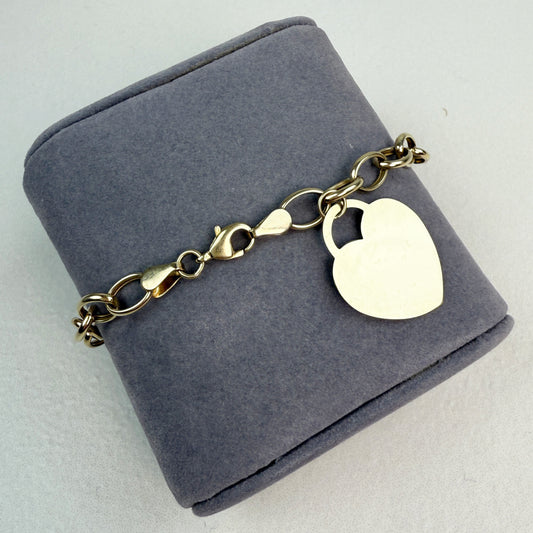 7" Oval Link Bracelet 10K Yellow Gold 6.69mm 4.76g with Heart Charm