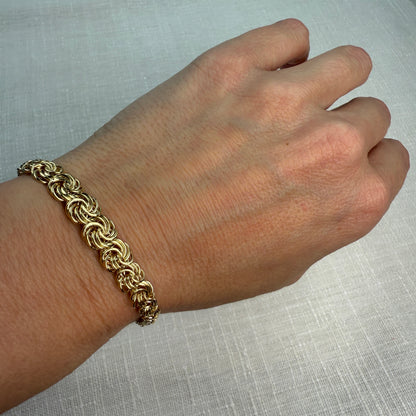 6.75" Graduated Swirl 14K Yellow Gold Statement Bracelet 8.4mm 3.89g