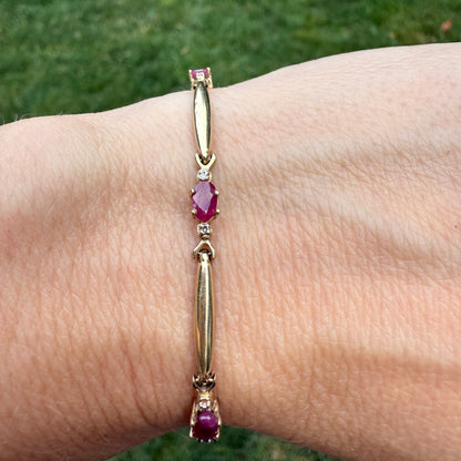 7" Solid 10K Yellow Gold Bracelet with Oval Rubies 4.4g (See Video for Condition)