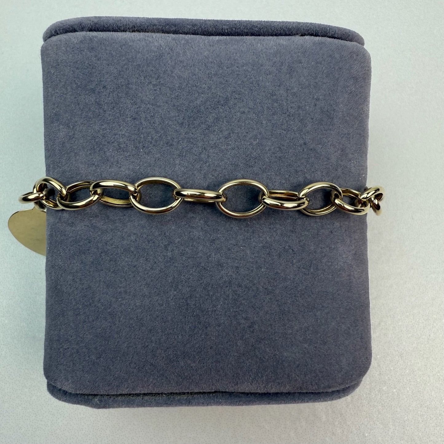 7" Oval Link Bracelet 10K Yellow Gold 6.69mm 4.76g with Heart Charm