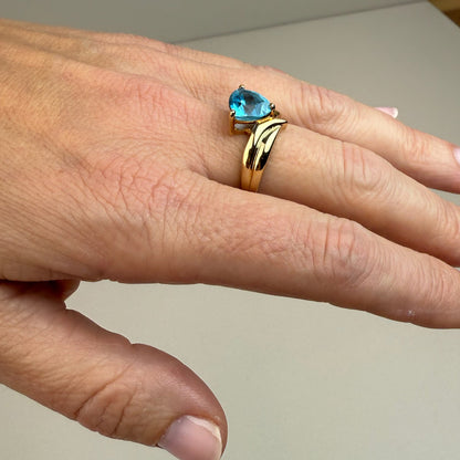 10K Sculptural Trillion Blue Topaz Yellow Gold Size 6.25